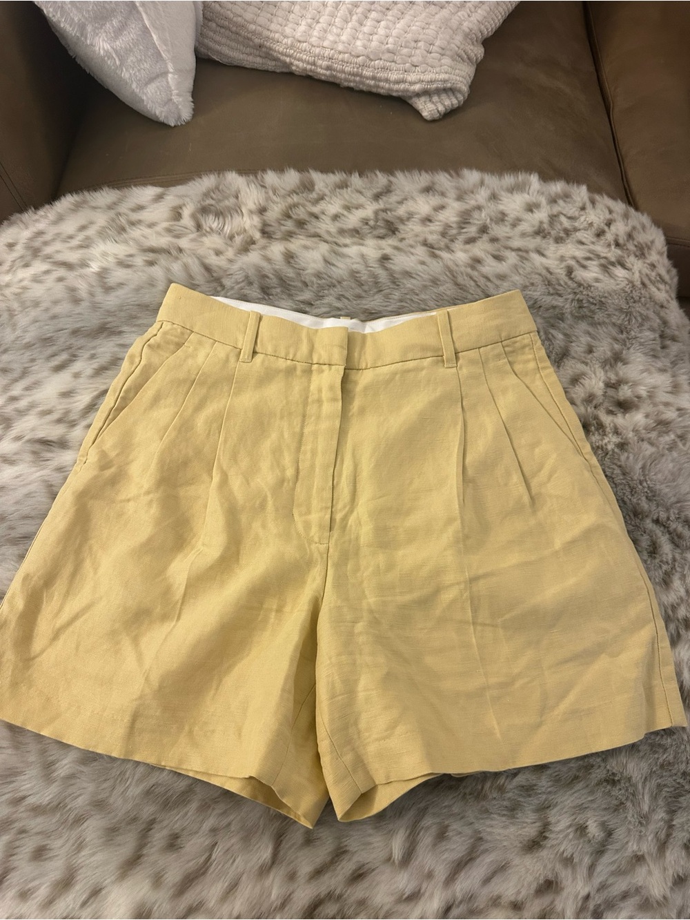 Aritzia Soft Yellow High-Waist Pleated Shorts